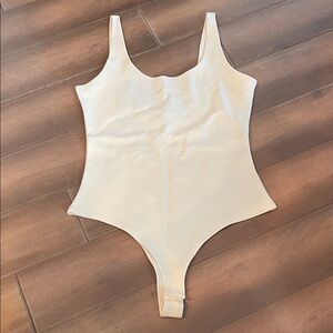 Cream Sleeveless Bodysuit